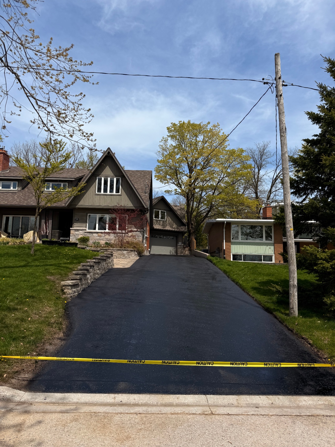 Freshly sealed residential driveway in Barrie